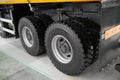 View on new clean rear tipper truck wheels and tires. Mud wheels for commercial transport, special cars. Truck chassis with wheels Royalty Free Stock Photo