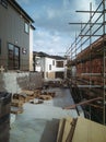 View of new home construction site with wooden frame