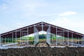 view of a new metal frame structure of an agricultural building under construction Royalty Free Stock Photo