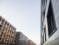 View on new modern buildings, facade corner and sky, parkings on line