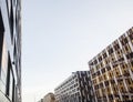 view on new modern buildings, facade corner and sky, real parkings on line