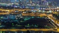 View of new modern buildings at nighttime in luxury Dubai city, United Arab Emirates Timelapse Aerial Royalty Free Stock Photo