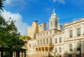 View on New York city NYC City Hall building and city park from Wall street and Nassau street, Brooklyn Bridge side. Old antique A Royalty Free Stock Photo