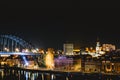 View of Newcastle Quayside and Tyne Bridge, illuminated at night on a clear evening Royalty Free Stock Photo