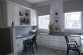 View of a newly designed study room with desk and chair inside a model home Royalty Free Stock Photo