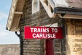 View of a newly painted, vintage metal sign seen on a railway platform in the UK. Royalty Free Stock Photo