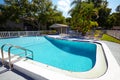 View of nice tropical pool in summer environment Royalty Free Stock Photo