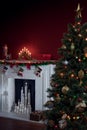 View of nice white christmas decorated fireplace Royalty Free Stock Photo