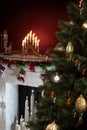 View of nice white christmas decorated fireplace Royalty Free Stock Photo