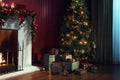 View of nice white christmas decorated fireplace Royalty Free Stock Photo