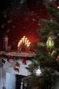 View of nice white christmas decorated fireplace Royalty Free Stock Photo