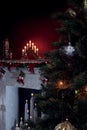 View of nice white christmas decorated fireplace Royalty Free Stock Photo