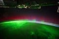 A view of the night earth taken aboard the International Space Station ISS showing an aurora.