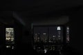 View of night skyscrapers of New York City Manhattan through windows of apartment. Top view of night midtown of Manhattan. Royalty Free Stock Photo