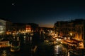 View of the night of Venice. Boats on the water. Moonlight