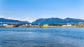 View of the North Shore of the Vancouver Harbor with the Lions Gate Bridge in the distance. Royalty Free Stock Photo