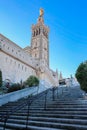 View of Notre Dame de la Garde on top of hill in Marseille. Basilica of Our Lady of Guard with morning rays of sun