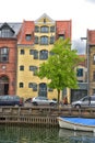 View of Nyhavn pier with color buildings, ships, yachts and other boats in the Old Town of Copenhagen, Denmark Royalty Free Stock Photo