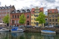 View of Nyhavn pier with color buildings, ships, yachts and other boats in the Old Town of Copenhagen, Denmark Royalty Free Stock Photo