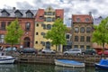 View of Nyhavn pier with color buildings, ships, yachts and other boats in the Old Town of Copenhagen, Denmark Royalty Free Stock Photo