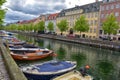 View of Nyhavn pier with color buildings, ships, yachts and other boats in the Old Town of Copenhagen, Denmark Royalty Free Stock Photo