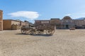 View at the Oasys - Mini Hollywood, a Spanish Western-styled theme park, Western cowboys scenario, old wooden cart, town with