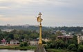 View from observation deck of belfry of Transfiguration Spaso-Preobrazhensky Monastery on spire with coat of Holy Gates, city an Royalty Free Stock Photo