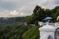 View from the observation deck, enclosed by a white fence, along the deep green canyon of the Smotrych River. Royalty Free Stock Photo