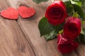 Occasional beautiful red roses with decorative hearts and a place for dedications or wishes