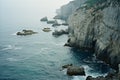 a view of the ocean and cliffs near the coast