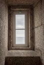 View of the ocean through a lighthouse window in the stone staircase Royalty Free Stock Photo