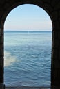 View of the ocean thou a archway
