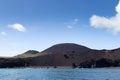 View from the ocean to Eldfell volcano. Icelandic landscape background. Heimaey Island, Vestmannaeyjar, Iceland.