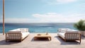 View of the ocean with wooden patio furniture and white couches