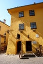 View of the ocher-colored house - the birthplace of Vlad Dracula