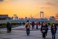 View at Odaiba west park bridge during sunset in the evening with rainbow bridge in the background Royalty Free Stock Photo