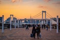 View at Odaiba west park bridge during sunset in the evening with rainbow bridge in the background Royalty Free Stock Photo