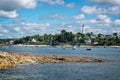 View of the Odet river with the lighthouse of BÃÂ©nodet in FinistÃÂ¨re, Brittany France Royalty Free Stock Photo