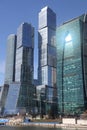 View of the office buildings of the Moscow City business center, skyscrapers, luxury apartments through green trees Royalty Free Stock Photo