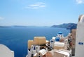 The famous blue domed Anastasis Church in Oia, Santorini, Greece