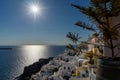 View of Oia town in Santorini with old white houses and windmill Royalty Free Stock Photo