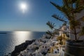 View of Oia town in Santorini with old white houses and windmill Royalty Free Stock Photo