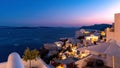 Oia village at the sunset - Aegean sea - Santorini island - Greece Royalty Free Stock Photo