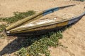 View of an old or abandoned fishing boat buried in beach sand, Kailashgiri, Visakhapatnam, Andhra Pradesh, March 05 2017 Royalty Free Stock Photo