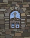 View from the old arched stone window of the ancient medieval church in visigothic style, vector