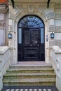 View of the old beautiful door at the entrance to the house. Royalty Free Stock Photo