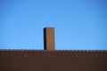 View of an old brick chimney on a roof Royalty Free Stock Photo