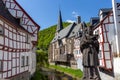 View from an old bridge on River elz and half-timbered houses in Monreal Royalty Free Stock Photo
