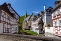 View from an old bridge on River elz and half-timbered houses in Monreal