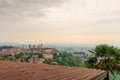 View on old city Citta Alta of medieval town Bergamo, Lombardy, Italy with roof tiles on sunrise. Travel destination Royalty Free Stock Photo